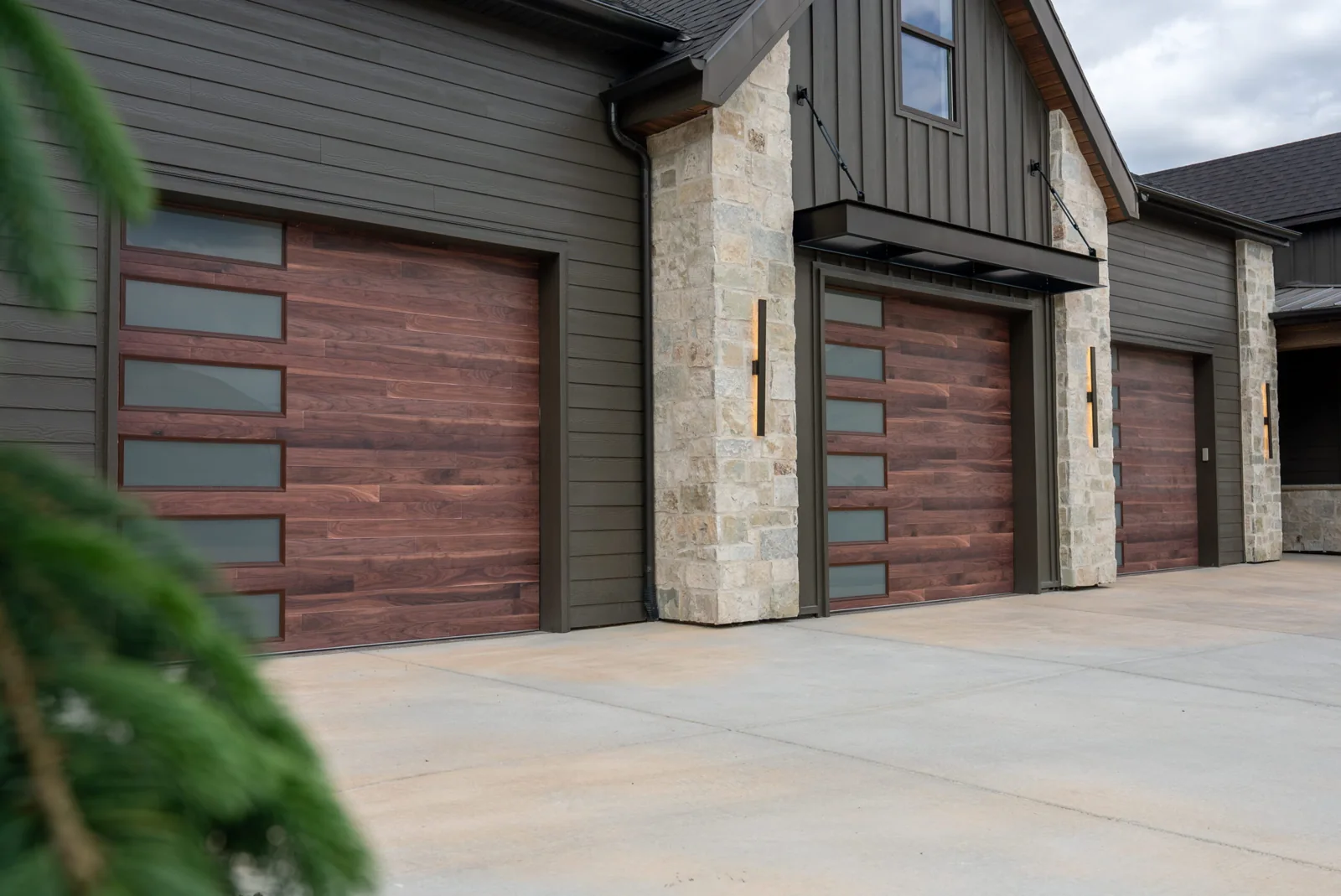 DESIGNER STEEL SERIES Color: Walnut Design: Ozark Plank Window Design: Vertical Stacked