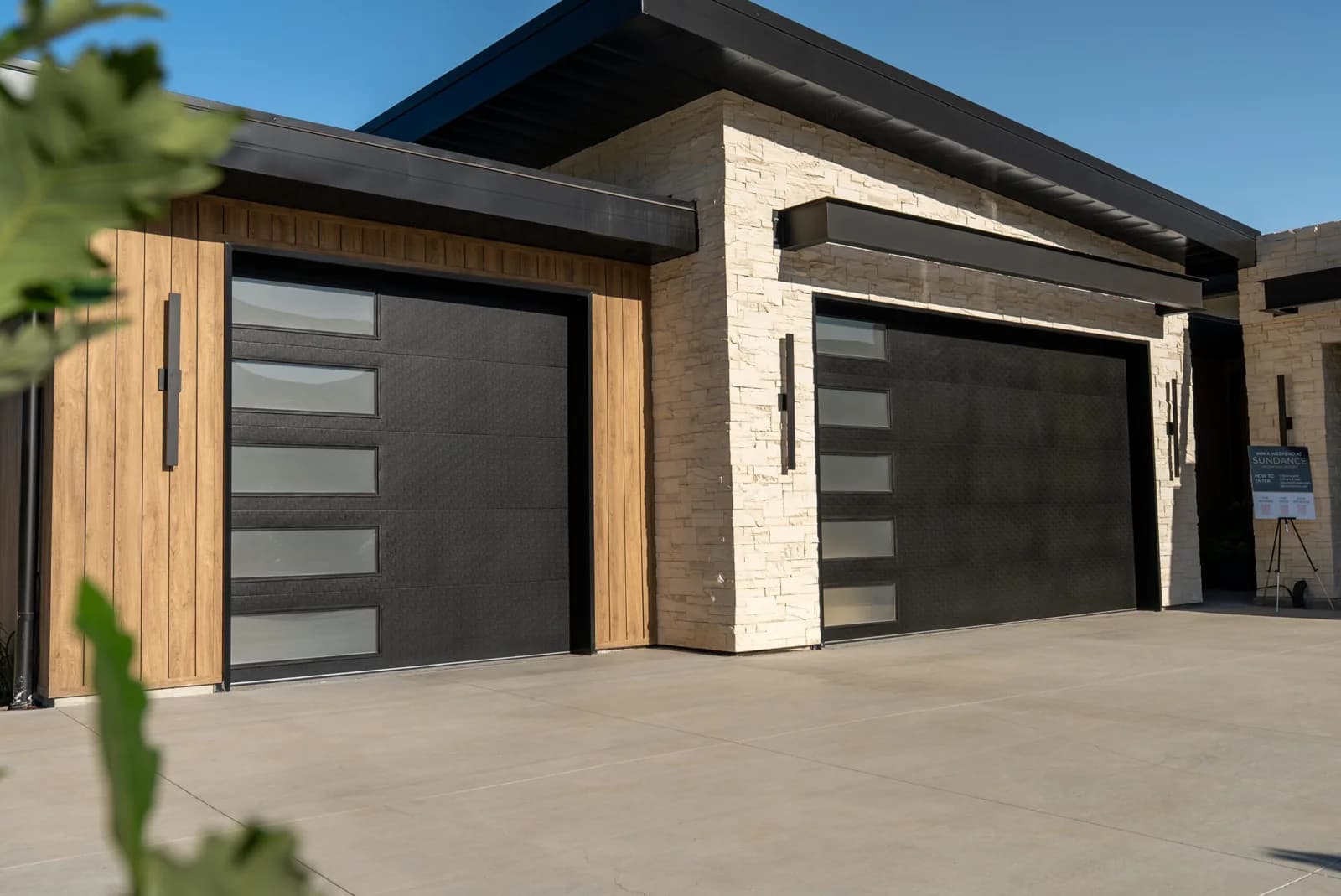 DESIGNER STEEL HIGH PERFORMANCE SERIES Color: Black Design: Flush Panel Window Design: Vertical Stack