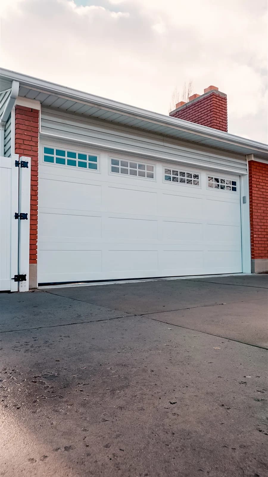 Designer Steel High Performance Series Color: White Design: Recessed Smooth Ranch Panel Window Design: Stockton Ranch